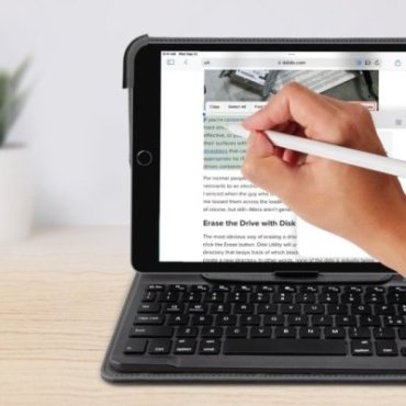 Universal wireless keyboard with integrated book cover